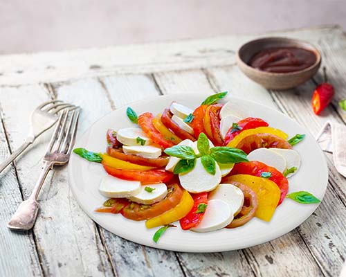 Salade de tomates colorées Bûchette soja & amande et basilic frais